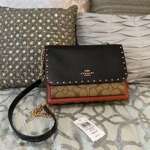 Klare Crossbody In Signature Canvas With Rivets BNWOT protective covers intact